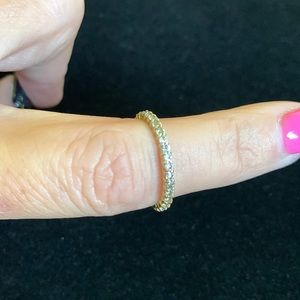 14 karat gold over sterling silver infinity band size 7. Very pretty.